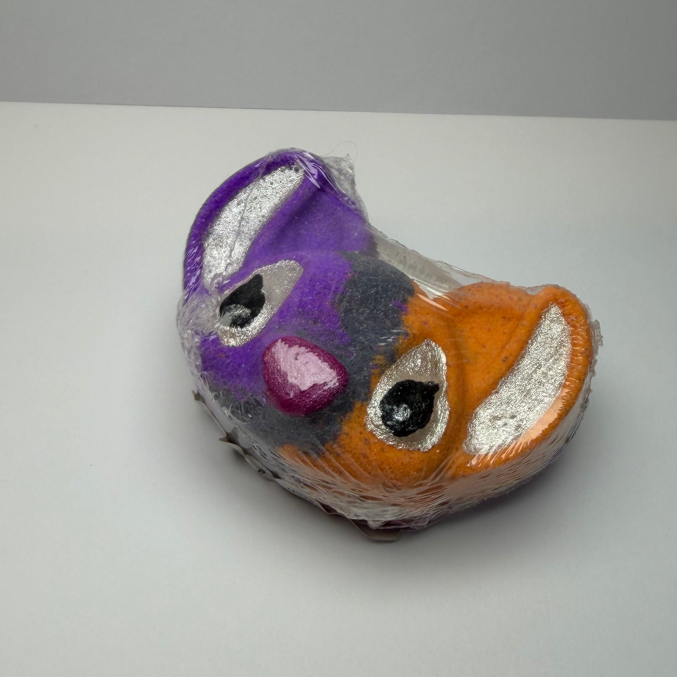 3 coloured alien bath bomb on white back ground 