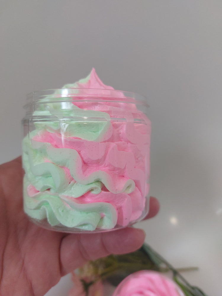 side view of whipped soap in green and pink in black cherry creamy texture by BubbleShop