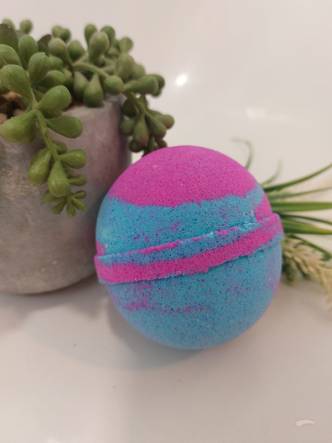 large bath bomb in bright pink and bright blue pink at top blue at bottom Bubblegum sweet candy fragrance by BubbleShop