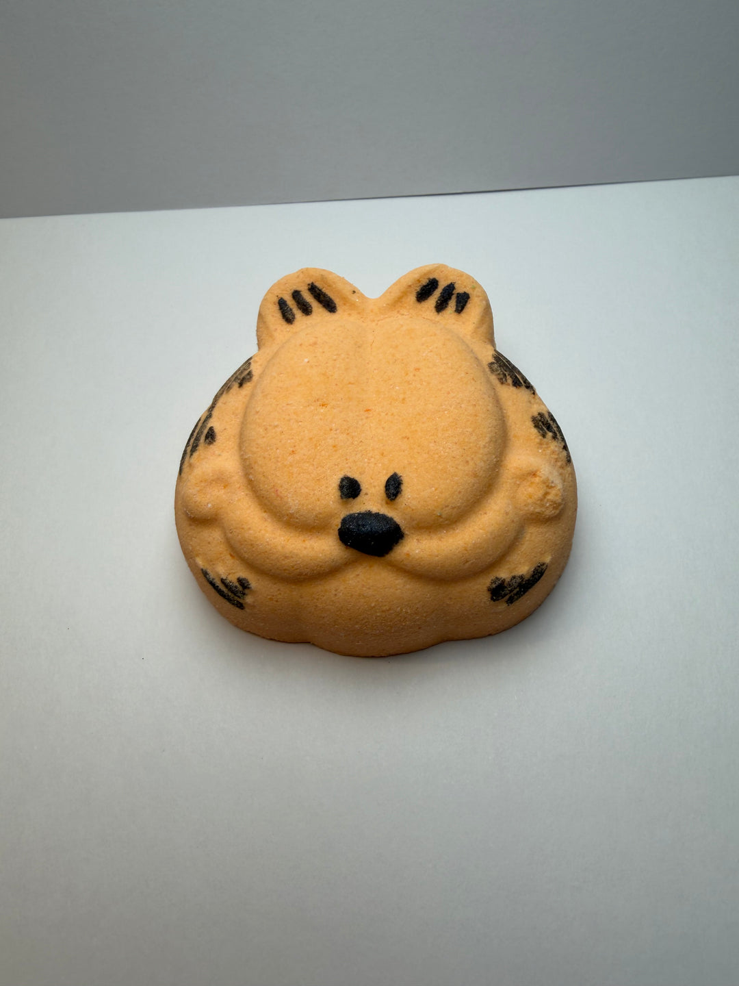 orange shaped bath bomb white back ground Garfield themed a fun playful  by  BubbleShop