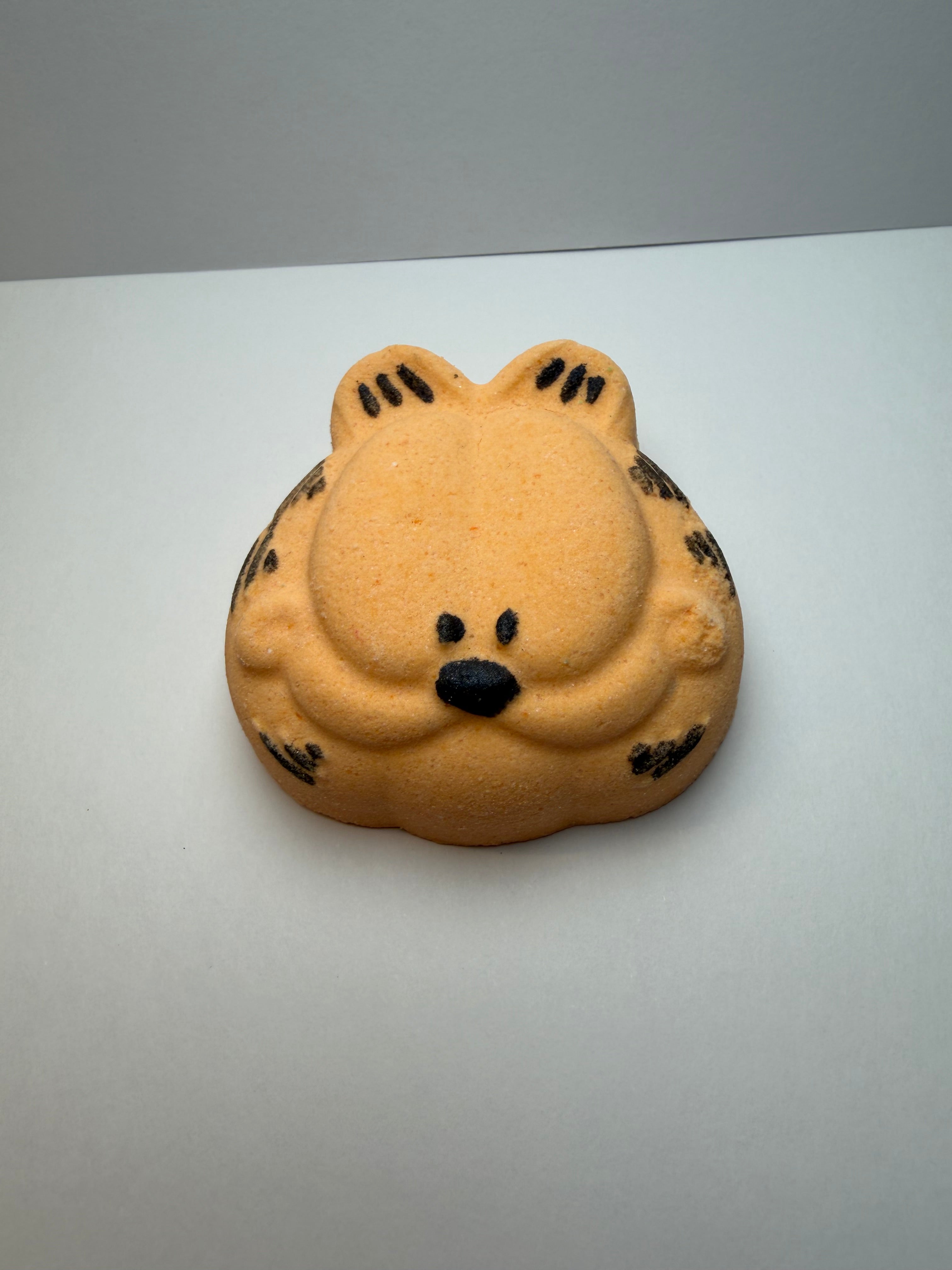 orange shaped bath bomb white back ground Garfield themed a fun playful  by  BubbleShop