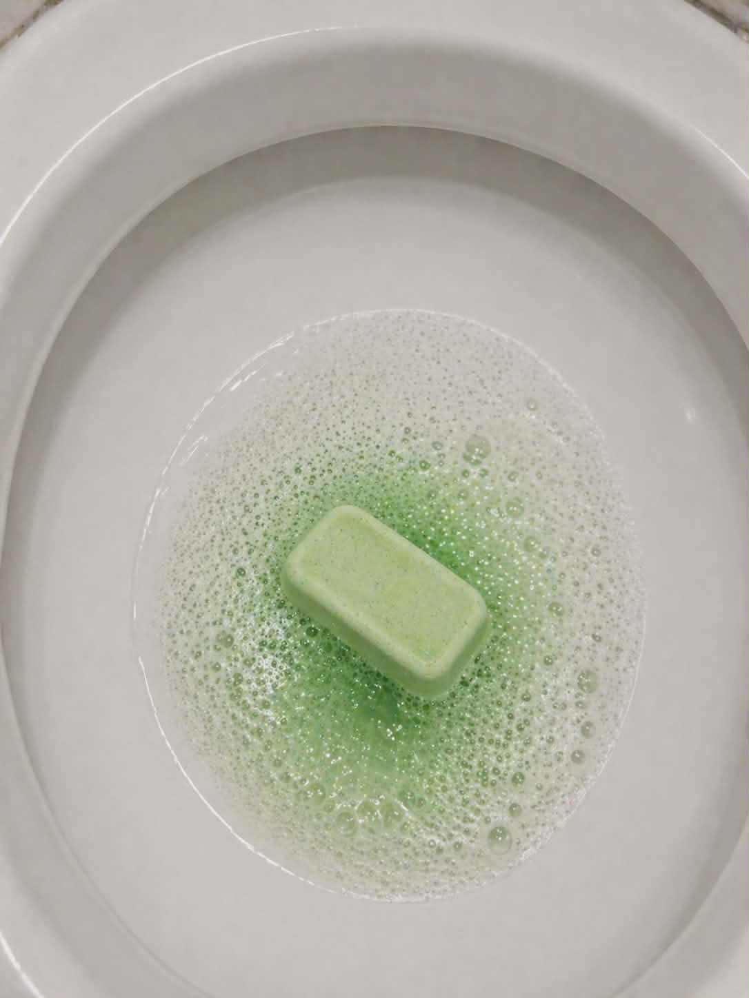 Ombre leather mop sink and toilet fizzers by BubbleShop luxury scented cleaning tablets for home cleaning photo of tablet in toilet