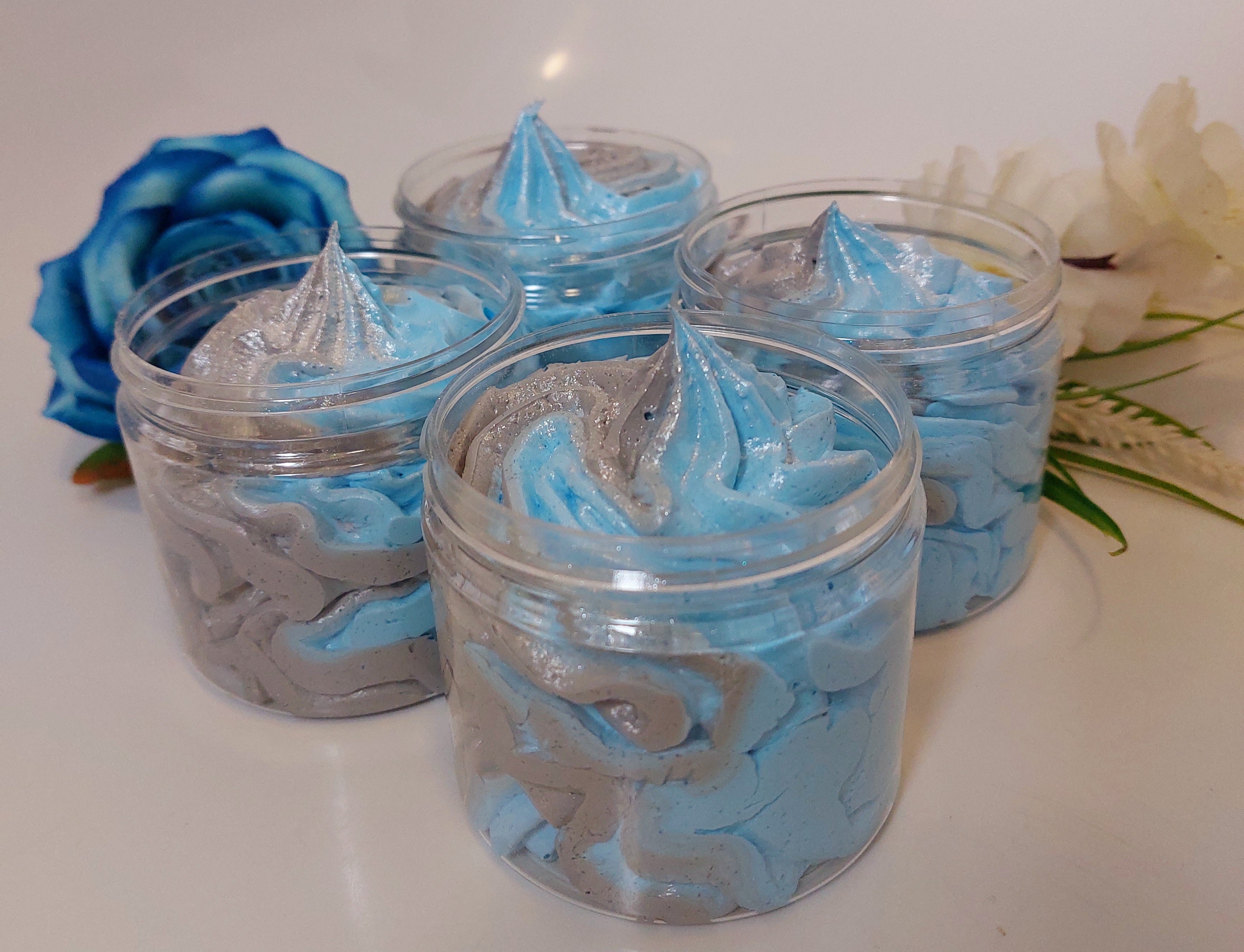 photo of 4 pots of blue and grey fluffy whipped soap in 120 gram clear pots in savage by BubbleShop