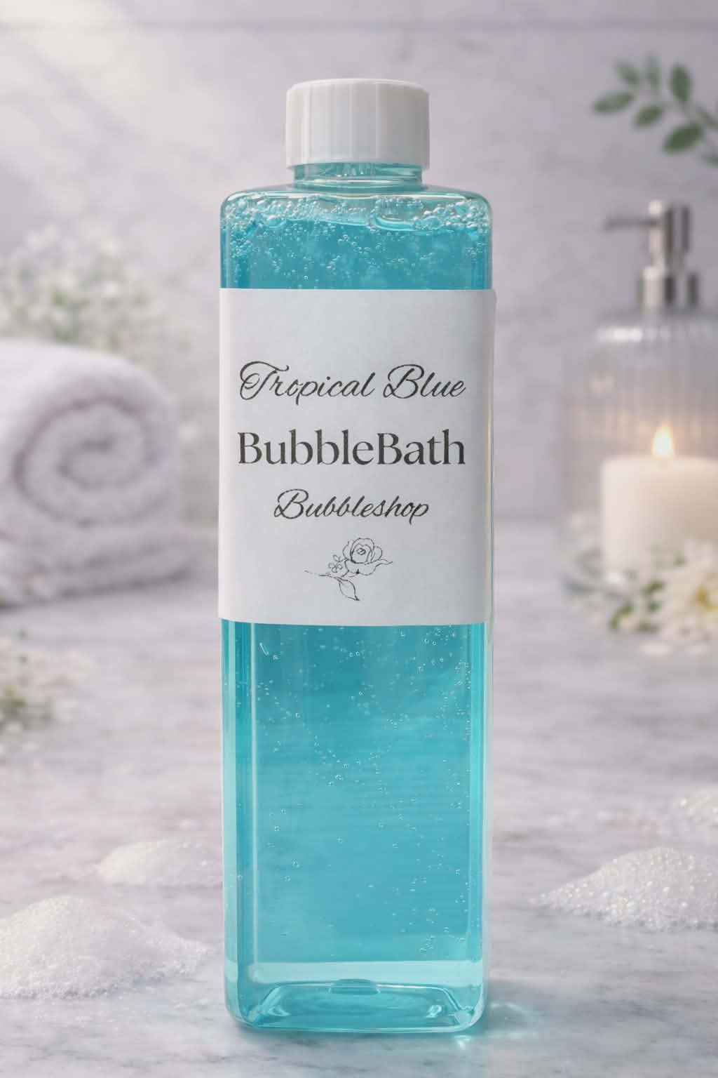 Tropical Blue Bubble Bath by BubbleShop in clear bottle with fresh back ground